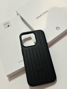 Rimowa Black Vertical Groove iPhone Case compatible for iPhone 15 Pro